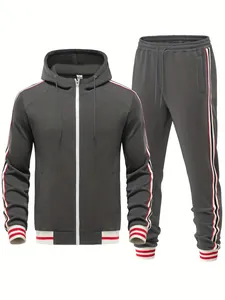 Detailed view of men's grey tracksuit set featuring side striped ribbons and hood