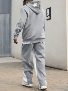 Detailed back view of a gray men's tracksuit set with a white star on the hood