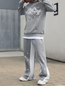 Grey men's streetwear tracksuit featuring white star patterns and graphic hooded sweatshirt