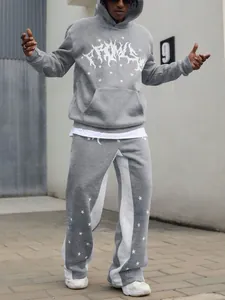 Men's grey streetwear tracksuit set featuring hoodie and joggers with white star patterns