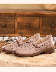 Detailed view of breathable hollow-out leather loafers with soft non-slip soles for women