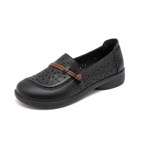 Comfortable black leather hollow-out shoes for women with soft sole and bow detail