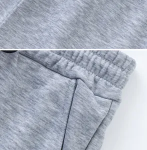 Detail of grey heavyweight cotton sports shorts showing waistband and fabric texture