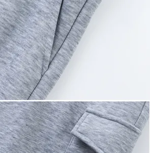 Close-up detail of side pockets and premium stitching on gray heathered heavyweight cargo shorts