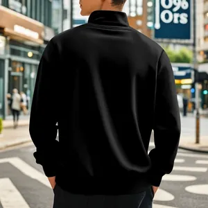 Back view of a black stand collar fleece jacket on a model in an urban street setting