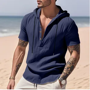 Men's navy linen beach hooded Henley shirt with short sleeves on sunny coast