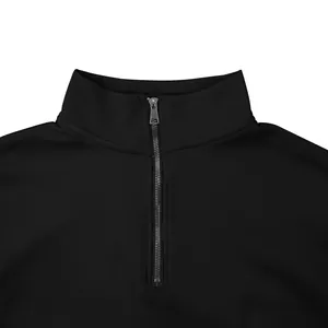 Detail shot of men's black quarter-zip sweatshirt with premium metal zipper
