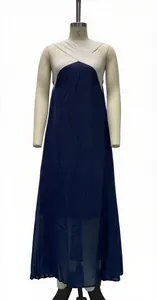 Detail of spliced sleeveless maxi dress with white cross halter neck and navy blue skirt