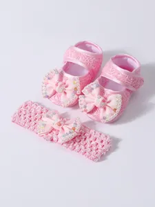 Sweet pink baby princess shoes and matching headband set with decorative pearl and rhinestone bows