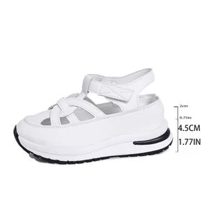 Side view of white platform wedge Roman sandals with velcro straps and 4.5cm heel height
