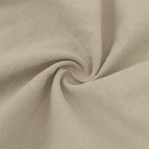 Macro view of breathable beige linen fabric texture showing detailed weave for men's suit