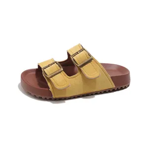 Sandales style Birkenstock en daim jaune avec double boucle et semelle épaisse marron