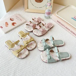 Elegantes sandalias planas con flores para niñas y lazos lindos en rosa amarillo y verde menta