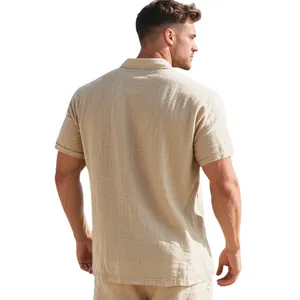 Back view of men's loose linen polo shirt showing breathable crinkle fabric texture