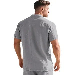 Rear view of a breathable gray linen short sleeve polo shirt showing fabric texture