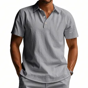 Detailed view of men's loose breathable grey linen polo shirt with a buttoned lapel.