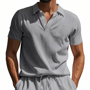 Close-up of gray breathable linen polo shirt with buttoned collar on model