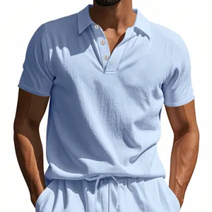 Detail view of light blue linen polo shirt featuring a breathable texture and buttoned collar