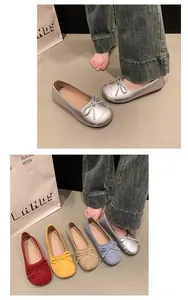 Vista dettagliata di scarpe basse da donna con fiocco in vari colori vivaci
