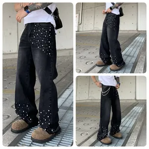 Men's loose straight black jeans with white pearl bead embellishments street style