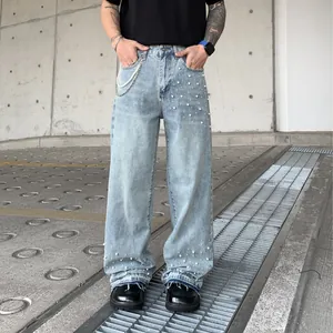 Stylish men's loose straight-leg light blue denim jeans with white pearl beads and chain