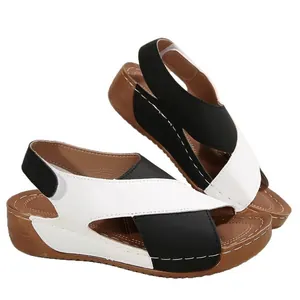 Sandalias de cuña con tiras cruzadas en blanco y negro para mujer con suela de plataforma gruesa