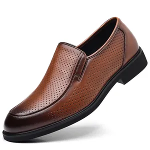 Brown breathable men's leather business shoes with slip-on design and perforated details