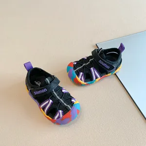 Detail showing the colorful painted sole and breathable mesh of these kids' sandals.