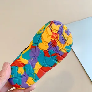 Close-up of colorful anti-slip sole on children's sandals for sports