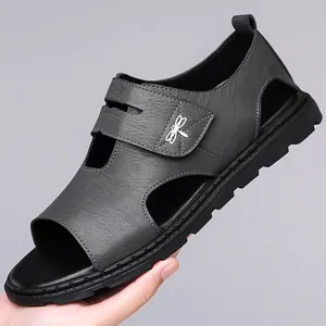 Trendy men's Roman leather sandals with soft sole and dragonfly logo in dark gray