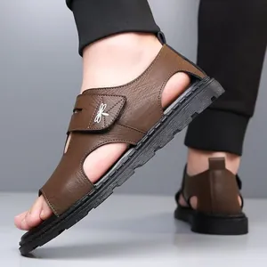 Men's brown leather sandals with soft sole for summer beach and casual outdoor wear.