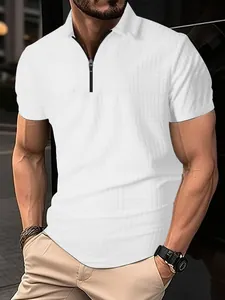 Close-up of men's white polo shirt with quarter-zip and textured grid pattern.