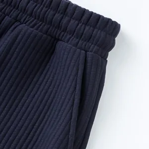 Close-up of premium navy heavy jacquard fabric texture on these men's casual shorts