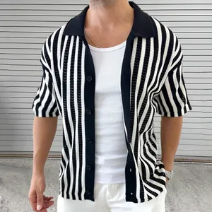 Macro view of the black and white striped knit texture on this stylish men's summer cardigan jacket.