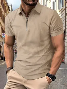 Detailed view of a khaki men's polo shirt with a unique textured pattern and half-zip