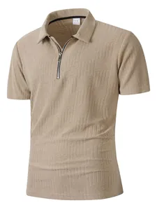 Close-up detail of a men's khaki polo shirt featuring a textured pattern and quarter-zip