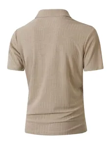 Detailed back view of a men's beige polo shirt featuring a geometric textured pattern.