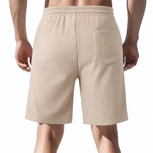 Back view of men's beige heavyweight textured jacquard casual sports shorts with pocket