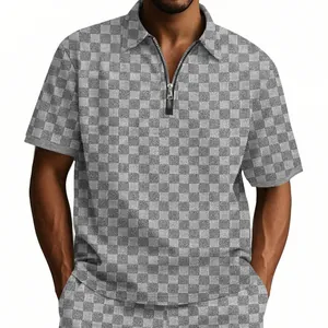 Close-up of the grey checkered jacquard texture on this men's casual half-zip polo shirt.