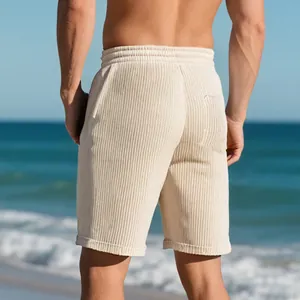 Rear view of men's beige heavy jacquard beach shorts with vertical stripe texture