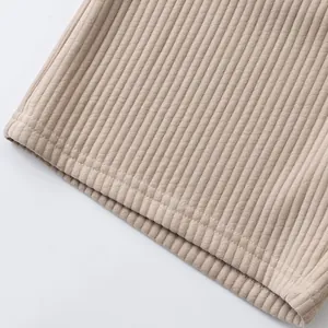 Macro view of heavy ribbed jacquard fabric on men's khaki casual beach shorts