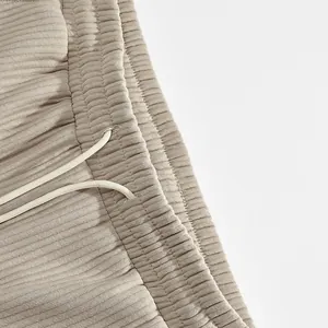 Macro detail of men's premium heavy ribbed jacquard casual shorts with drawstring