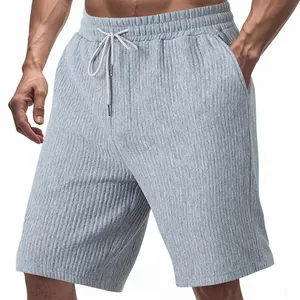 Detail of men's light gray jacquard textured casual shorts with adjustable drawstring waist