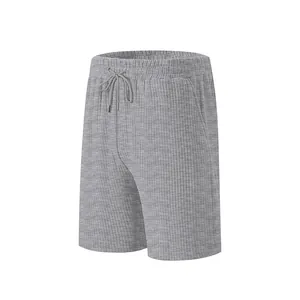 Close-up of grey men's casual jacquard textured shorts with adjustable drawstring waist