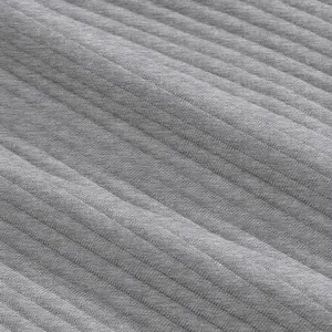 Close-up of premium grey jacquard ribbed fabric for men's casual beach shorts texture