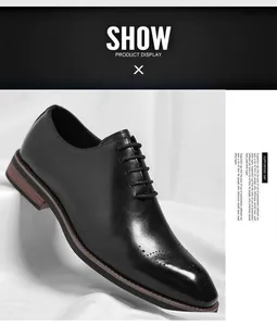 Men's black leather Oxford shoes with formal brogue toe detail for business