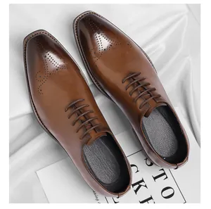 Overhead detailed view of men's premium brown leather Oxford dress shoes with square toe
