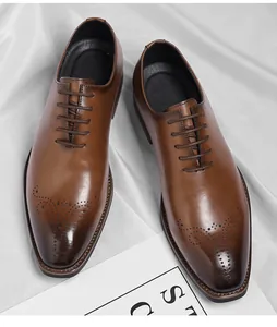 Detailed view of brown men's oxford shoes with elegant wingtip brogue patterns