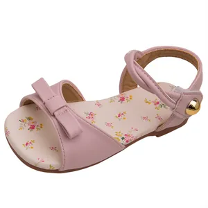 Sweet pink girl's sandals with delicate floral print and bow decoration for summer wear