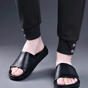 Classic black men's summer slide sandals with textured upper for casual outdoor use.